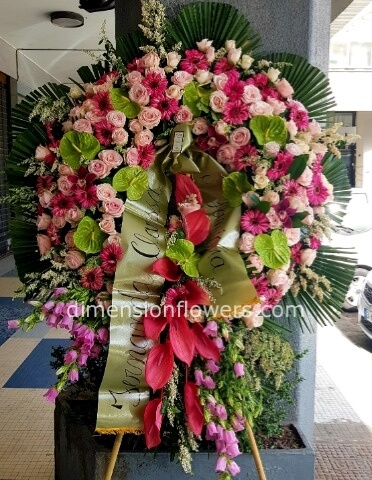 Corona funebre tonalità rosa